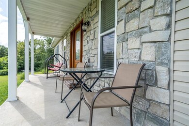 Stone Accents on Covered Front Porch!