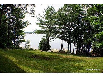 View. Gentle rolling lawn to the water.
