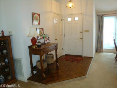 Entry. Entry of home with small step down, Coat Closet