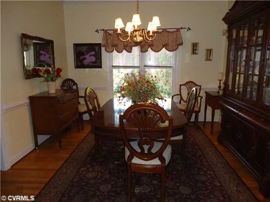 Dining Room - Elegant formal room with crown moldi