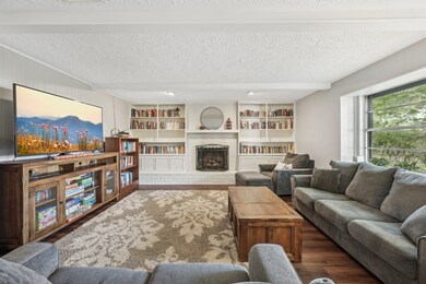 Fireplace and built-ins in the family room that ad