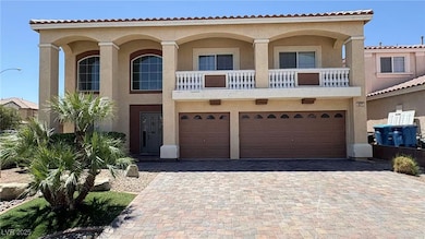 View of front of house featuring stucco siding, an