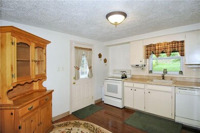 Kitchen - Light and bright, door to rear yard.