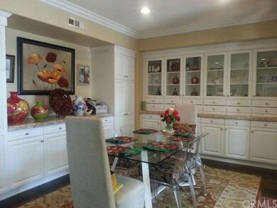 Dinning Room next to the Kitchen with built-in sho