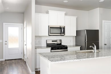 This move-in ready home features gorgeous granite 