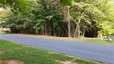 View of front of .98 acre lot...box to box.