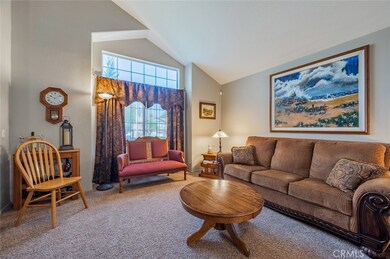 Front view of the Formal Living Room, beautiful natural light is filtered through this front window.