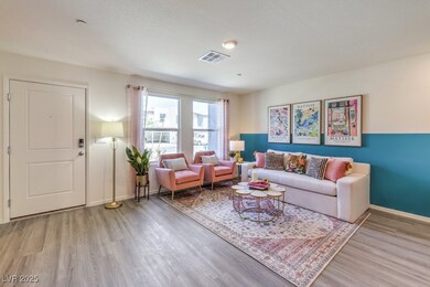 Living room with wood finished floors, baseboards,