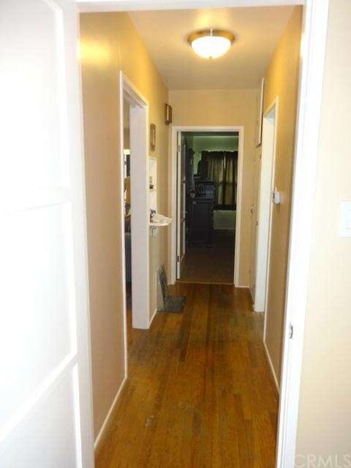HALLWAY TO BEDROOMS AND BATHROOM