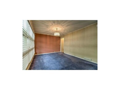 Dining area opens to kitchen