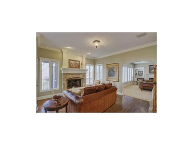 Stone fireplace in hearth room.