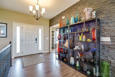 Foyer w/split tile accent wall