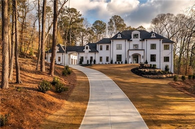 French country style house with stucco siding and 