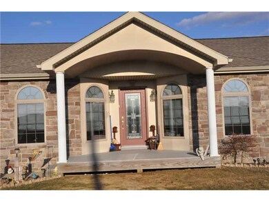 Exterior Front. Elegant Stone Work!!!