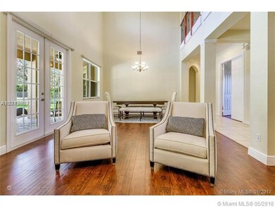 Living and Dining room area with high ceiling, lot