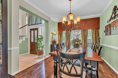 The formal dining room can accommodate a large tab