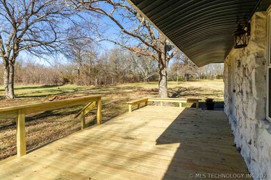 Side deck with living room entry.