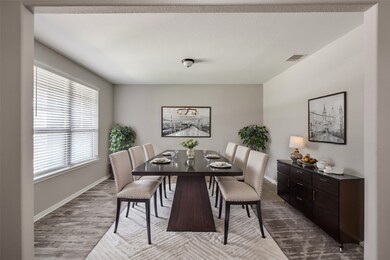 Formal dining room off the foyer.