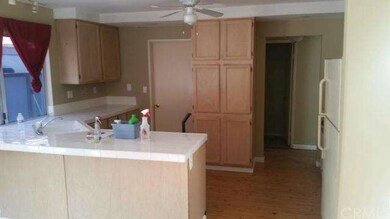 There was a leak in the kitchen, which warped the 