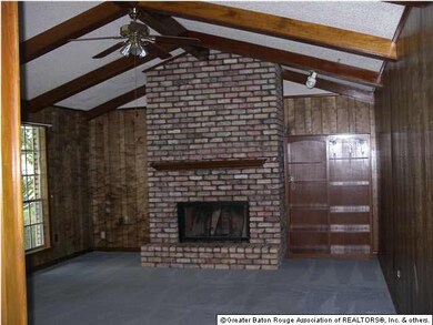Living Room with fireplace and built-ins.