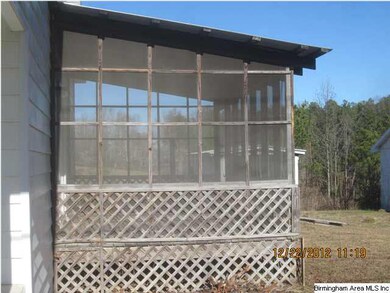 View of covered porch from right front.