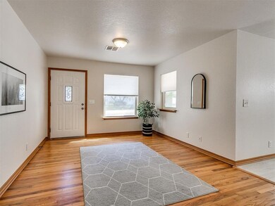Foyer with hardwood