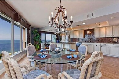 Expansive water views from kitchen and dining area