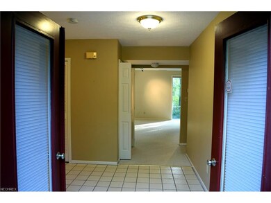 Tile floor entry thru French Doors with Living Roo