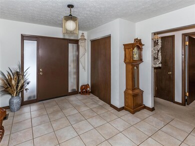 Entry Foyer:  with flawless ceramic tile