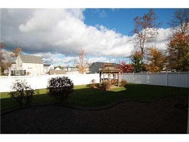 Exterior Back Fully fenced yard with charming gaze