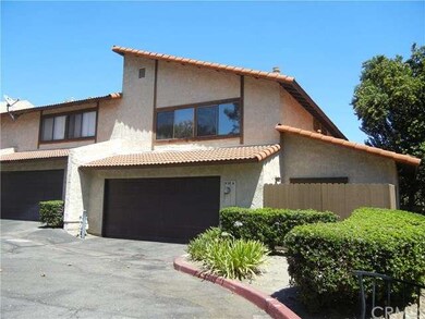 Rear View and 2 Car Garage and Downstairs bedrooms