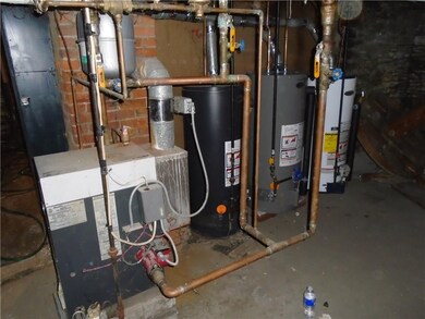 Three separate hot water tanks and boiler for down