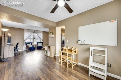 Miscellaneous room featuring a textured ceiling, c