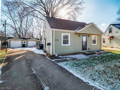 View of front facade featuring a garage