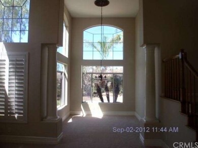 Entry/ Looking at Formal Dining Room