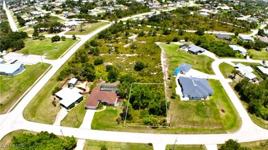 Aerial view of residential area featuring property