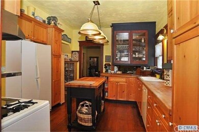 Kitchen facing West from back porch. *Click to Enl