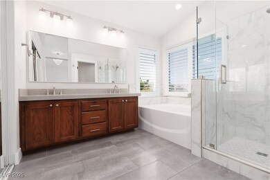 Full bathroom with a garden tub, a marble finish s