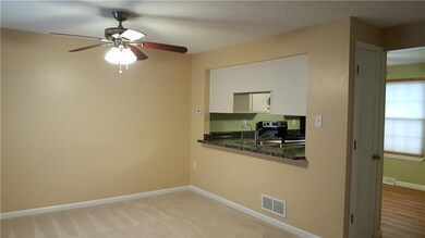 Pass-thru from kitchen to Dining Rm makes entertai