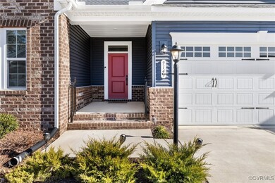 Property entrance featuring a garage