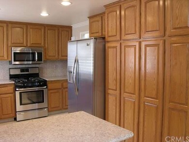 Spacious pantry and lots of kitchen storage.