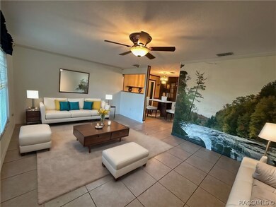 Living room with wall mural (virtually staged)
