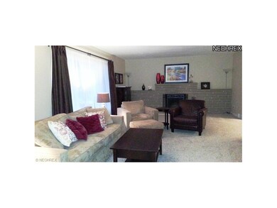 The oversized living room offers new carpet, netur
