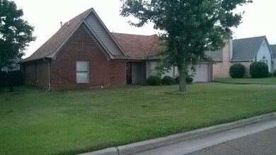 Lovely brick home with that needs a new owner.