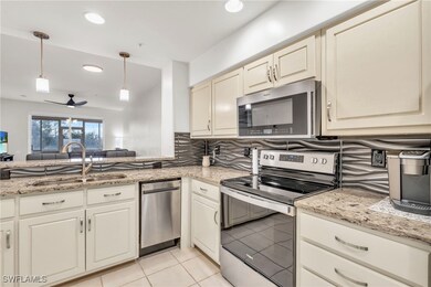 Kitchen featuring tasteful backsplash, stainless s