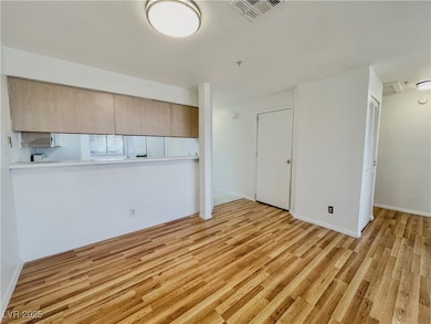 Entry front door to the home leads into the Kitchen and Dining Area.
