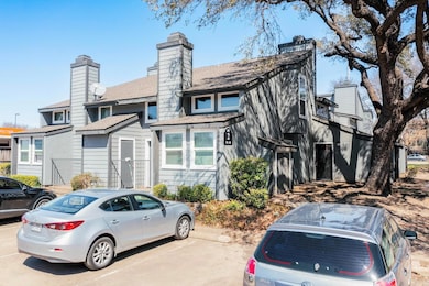 View of front of home with uncovered parking
