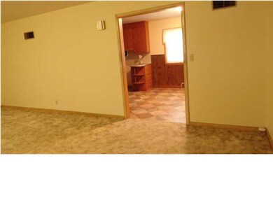 Living room opens to kitchen