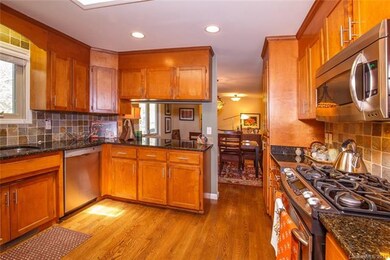Kitchen view to dining area, gas cooktop