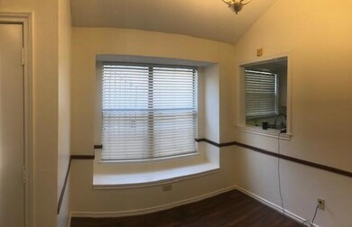 Room details featuring wood-type flooring